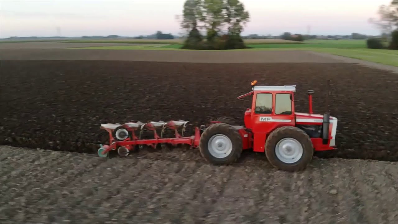 Massey ferguson 1250 plowing the field