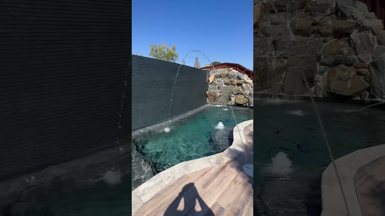 Grotto with custom waterfalls #grotto #waterfall #pool