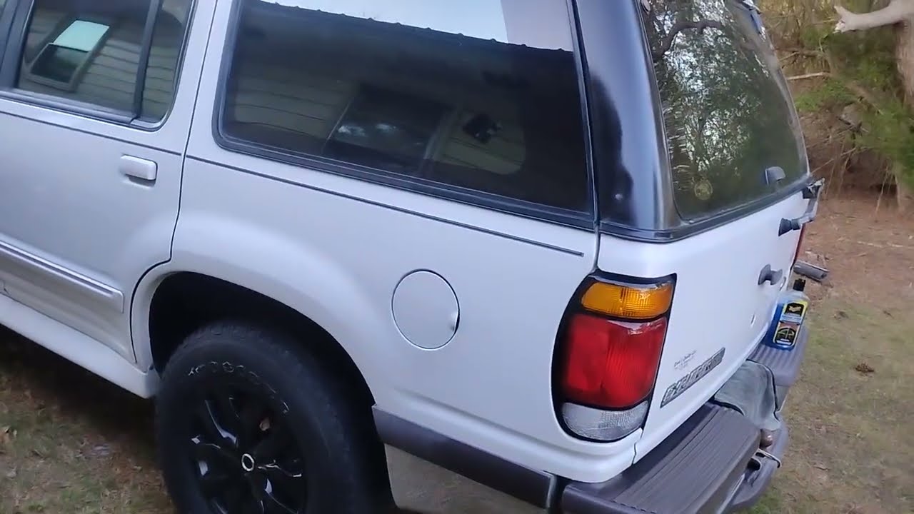 New meguiars ultimate insane tire & trim shine test on dull grey bumper trim 