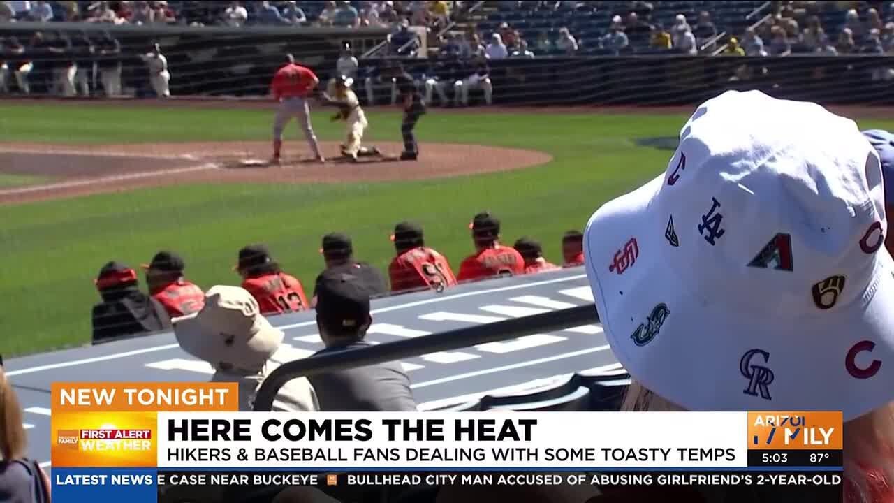 Uncommon February heat greets baseball fans & hikers