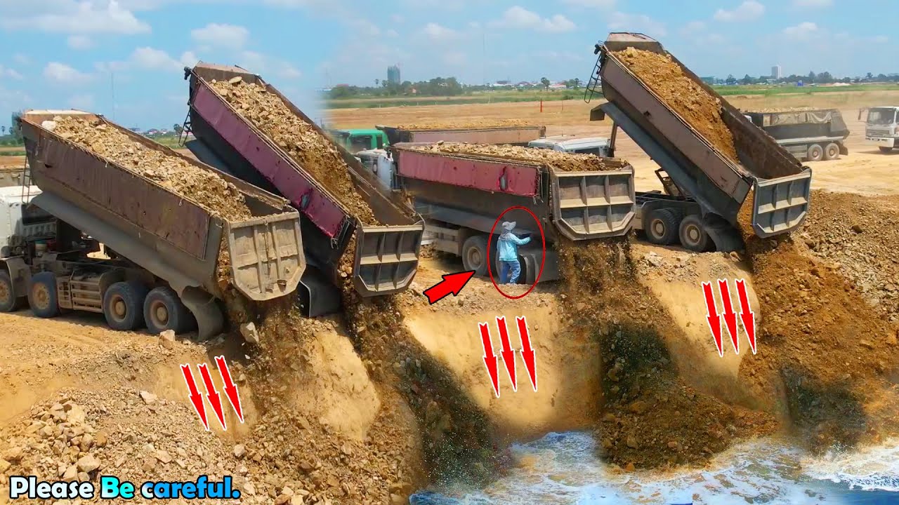 Be Amazing video of rock being dropped into the deepest lake ever by a 25Ton & KOMATSU Dozer pushing