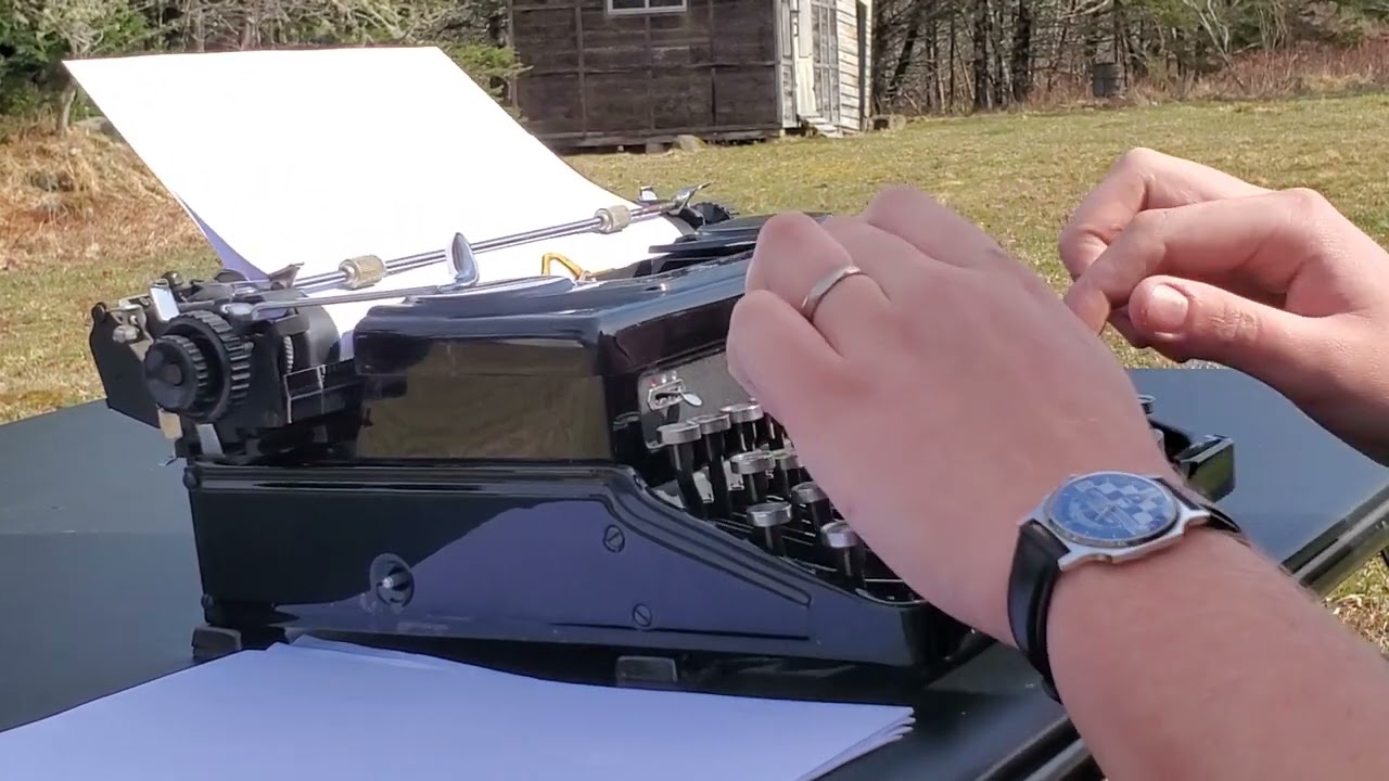 Typing on a 1950 Everest Mod. 90 Portable Typewriter.