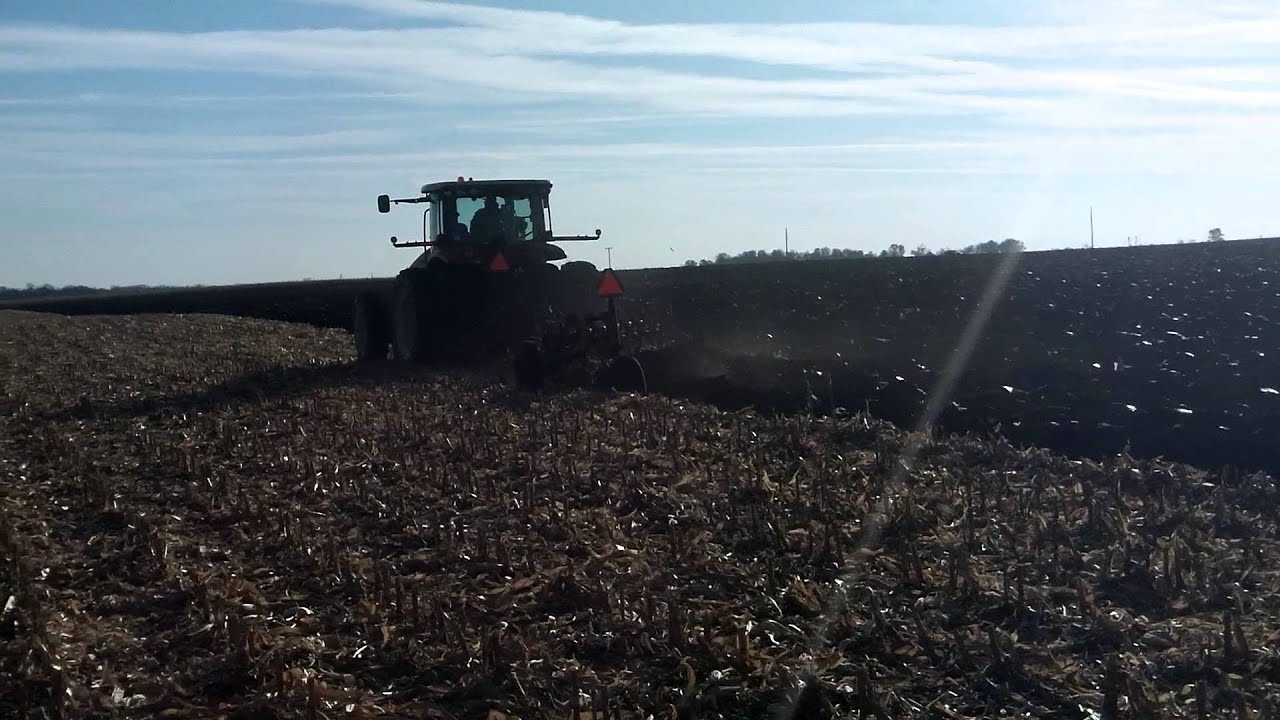 Plowing a harvested Corn Field with a Versatile 310 and International 7 bottom plow.