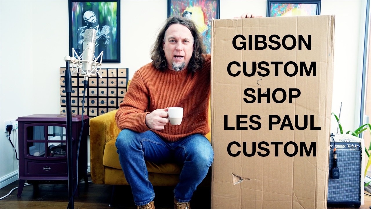 Распаковка: Gibson Custom Shop Les Paul Custom 2010 года, цвет винно-красный.