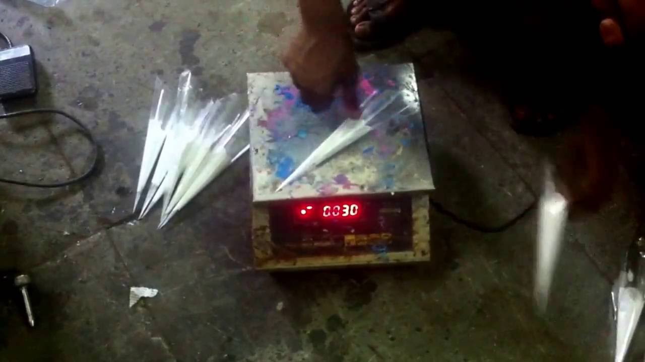 Mehandi cone filling machine.Fabric glue cone filling semiautomatic Mehndi filling.      08451899989