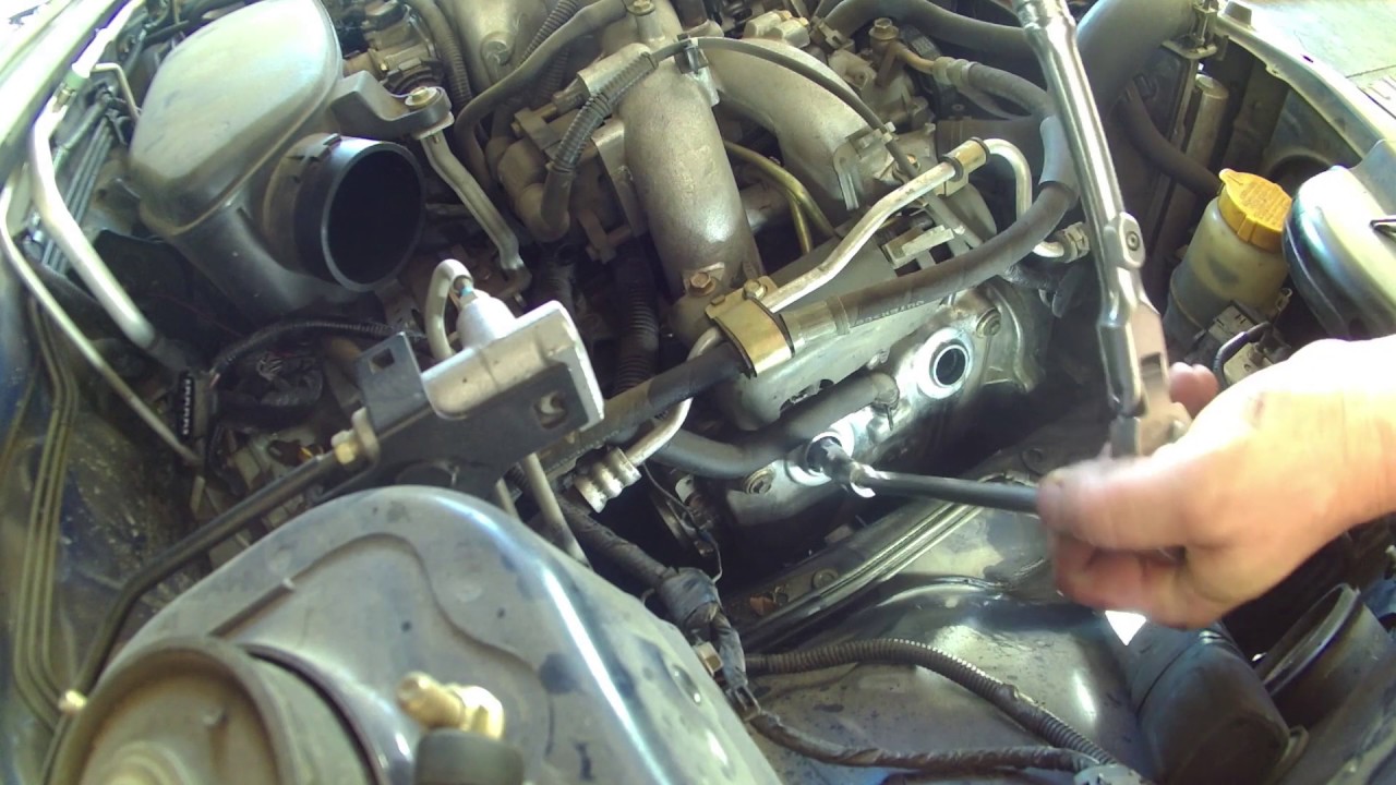 Spark plug replacement 2005 Subaru Forester tune up. how to change spark plugs