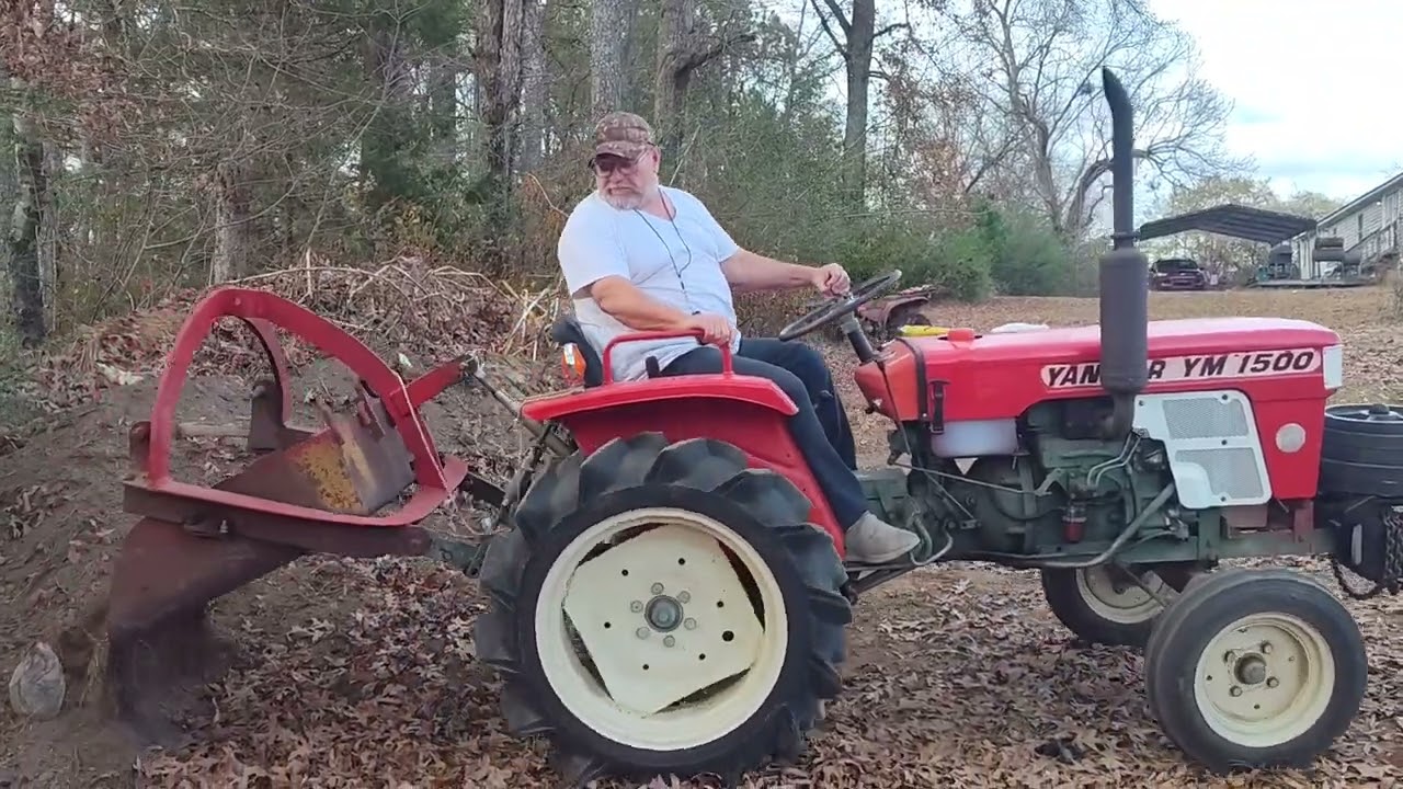 Using a pond scoop or dirt scoop on a yanmar tractor.