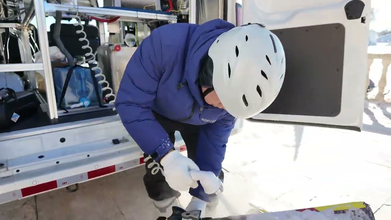 Washing the Snowboard With Hot Water, a Nice Application for Water Heater.