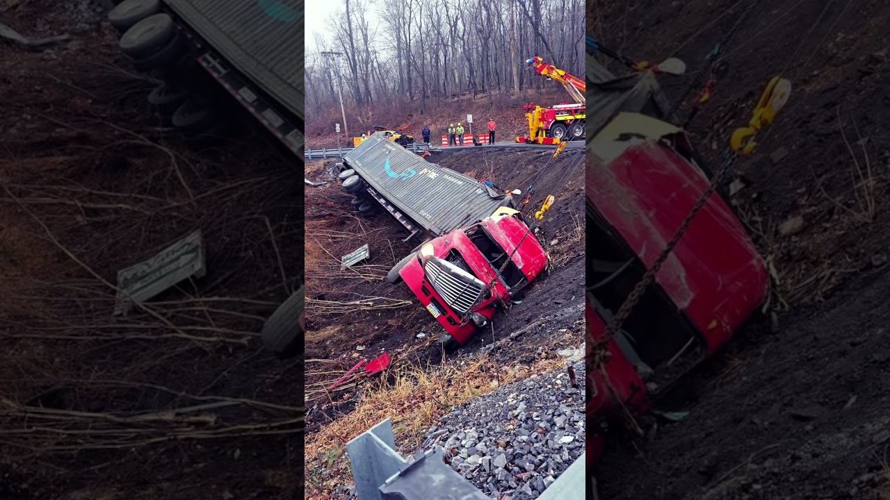Loaded Overturned Semi Recovery over 50' Embankment 