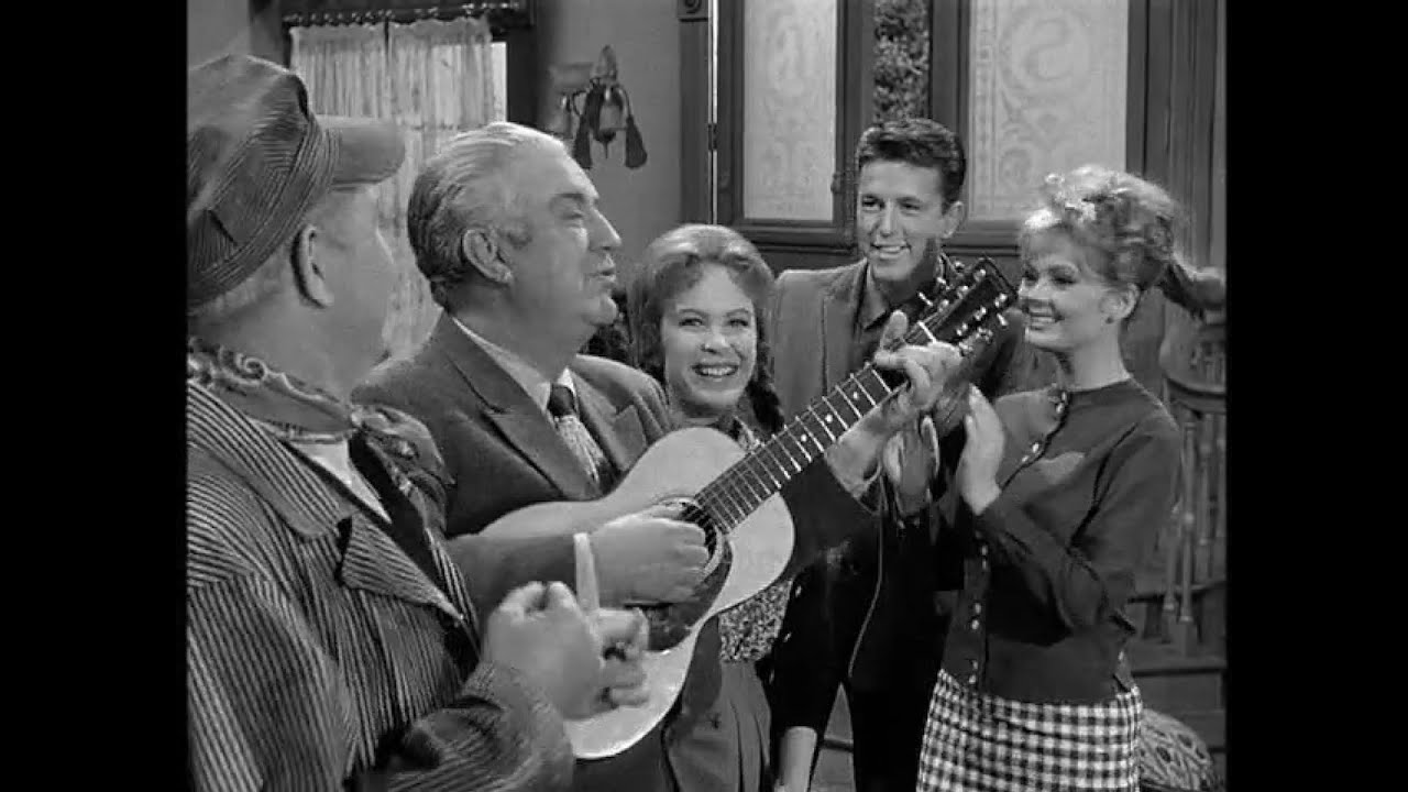 Charley (Smiley Burnett) sings 