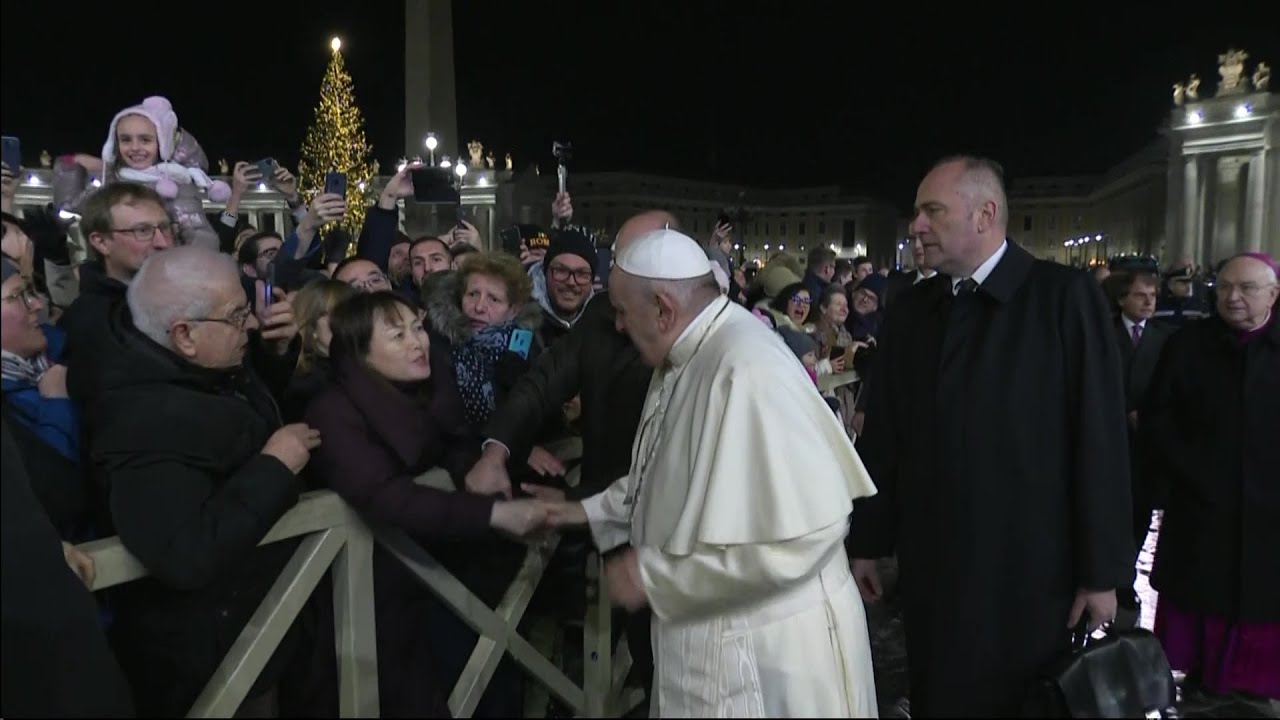 Pope apologizes for slapping woman's hand after she aggressively grabbed him