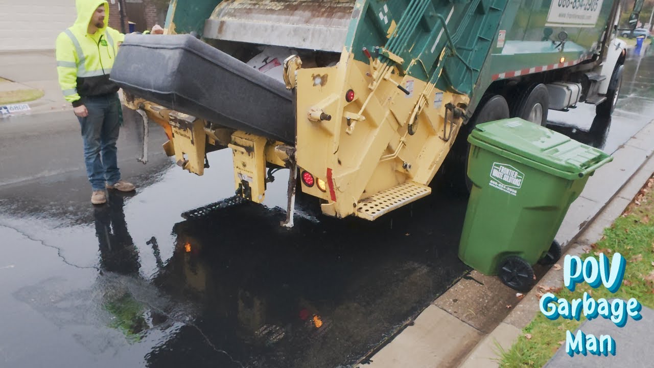 Garbage truck collecting bulk garbage by hand POV | 4K Full HD