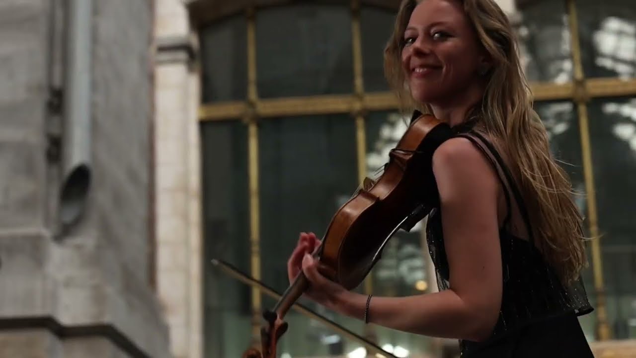 Cinematic Violin Performance in Antwerp Center Station.