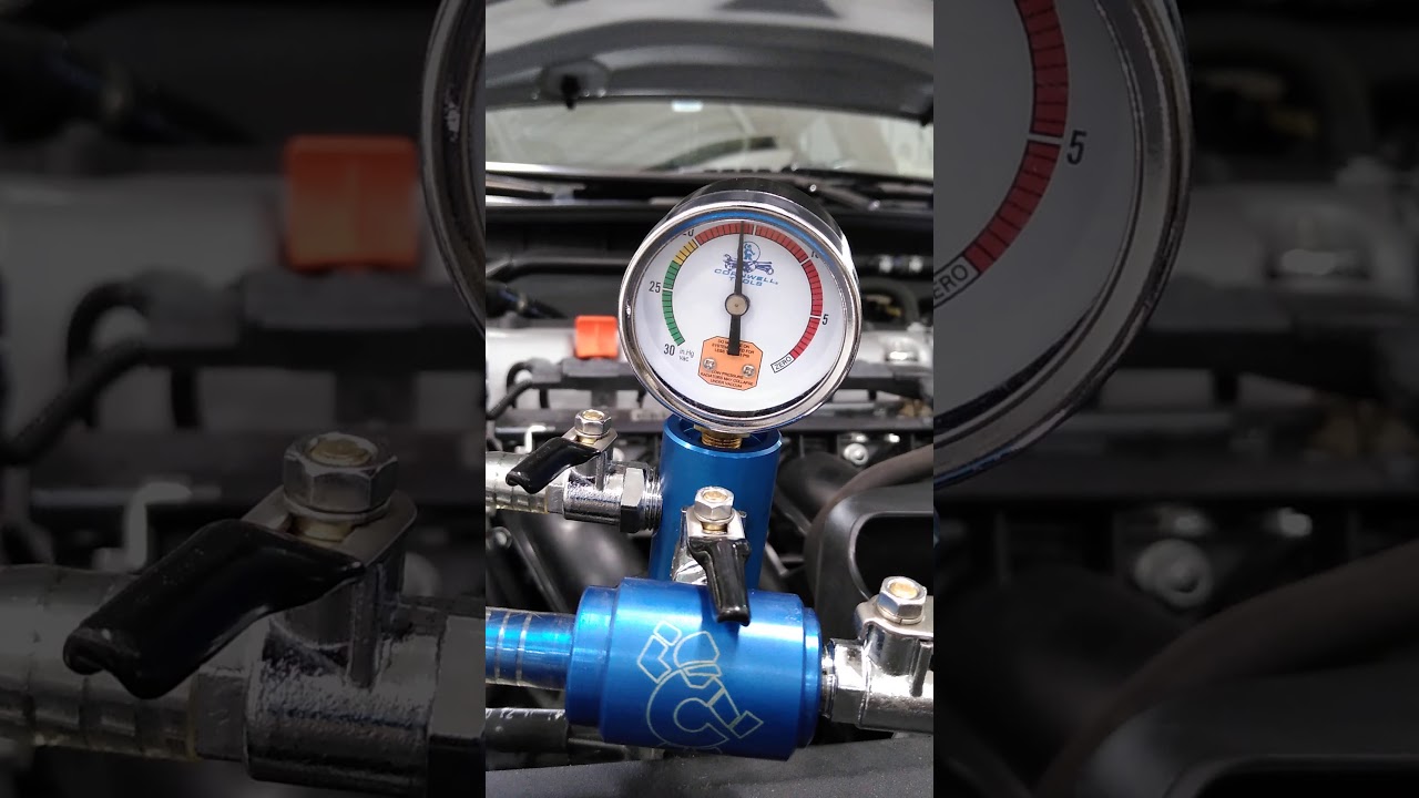 Burping the coolant system with a vacuum coolant filler