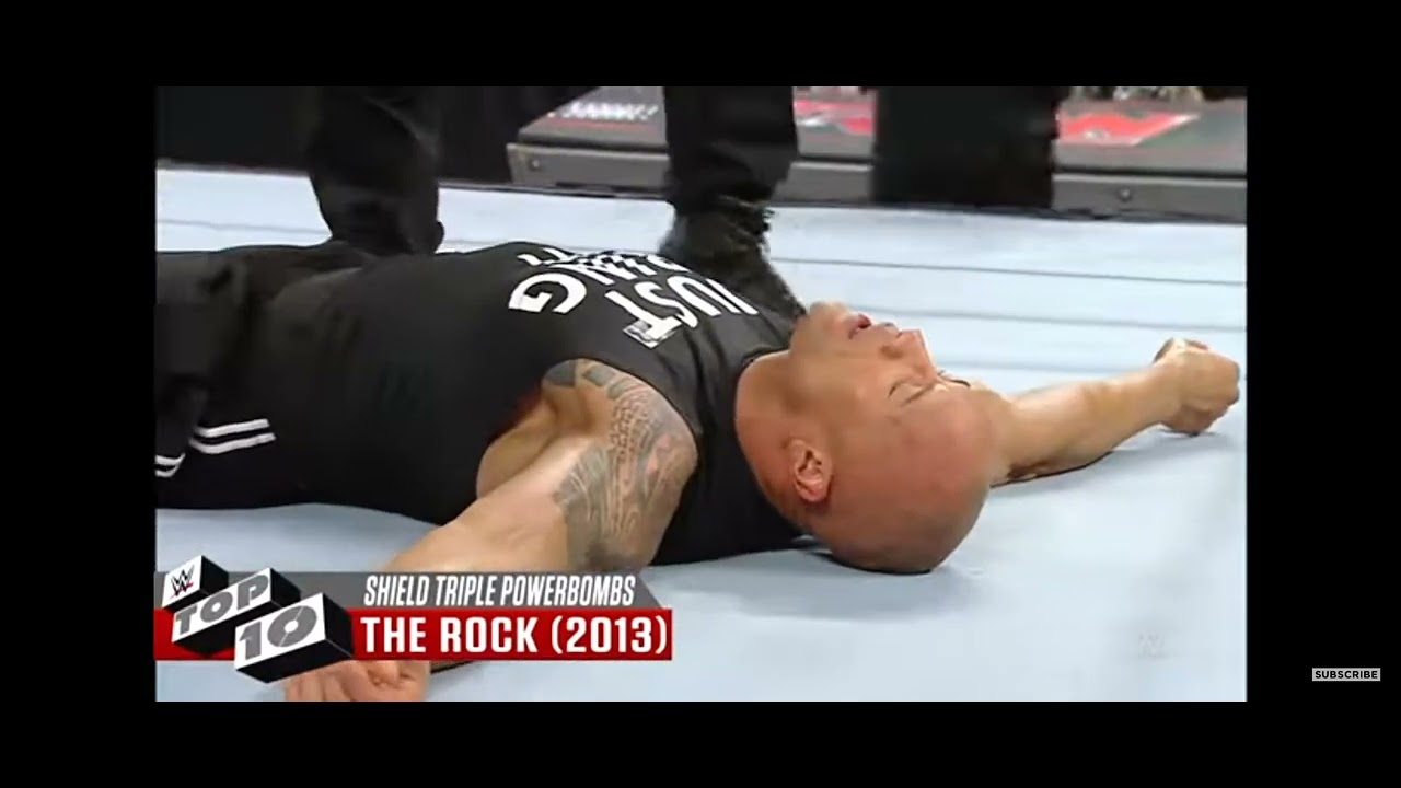 The Shield Triple Powerbomb on The Rock