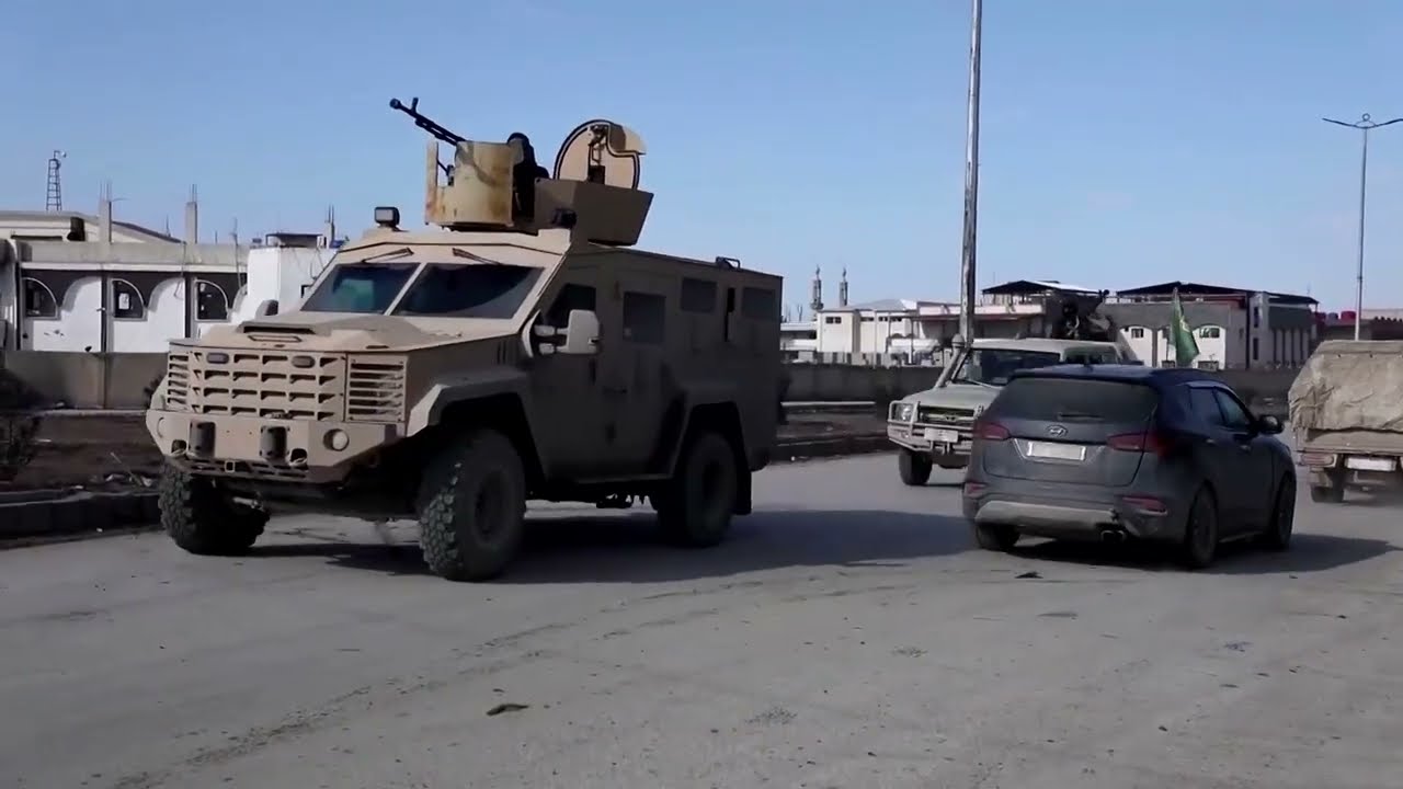 Kurdish forces agree to merge with Syrian state, easing tensions