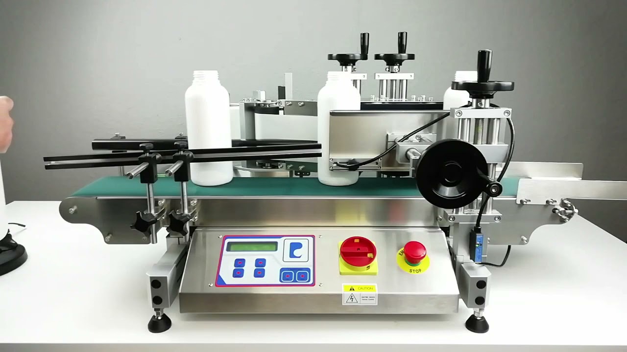 Rundum Etikettieren von Kunststoff-Flaschen mit Pack Leader ELF-50 Flaschenetikettiermaschine