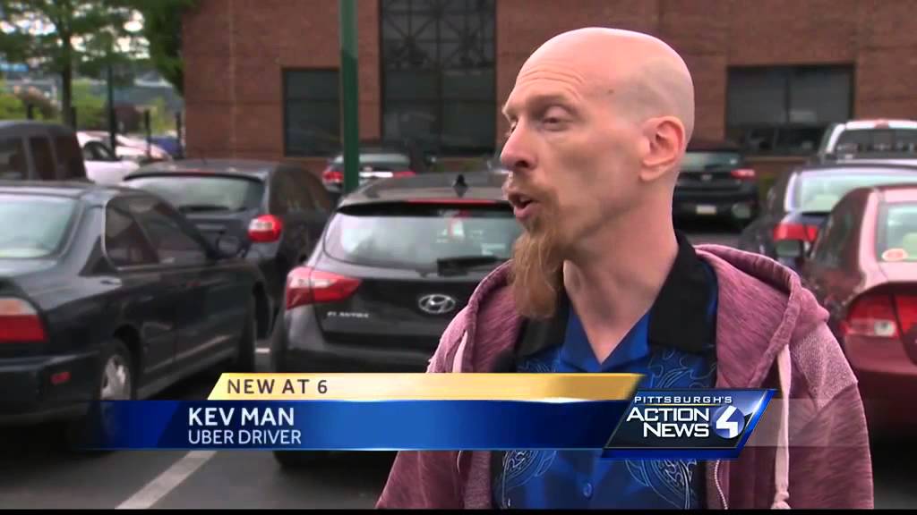 Uber driver's dash-cam catches woman on phone before near collision