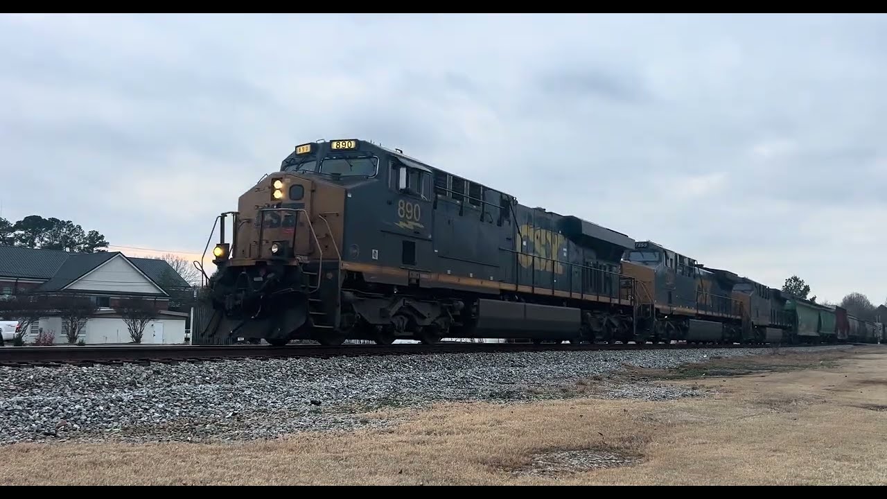 CSX M653 goes through Wingate, NC with friendly crew and a DPU that happens to be 1852! (WM)