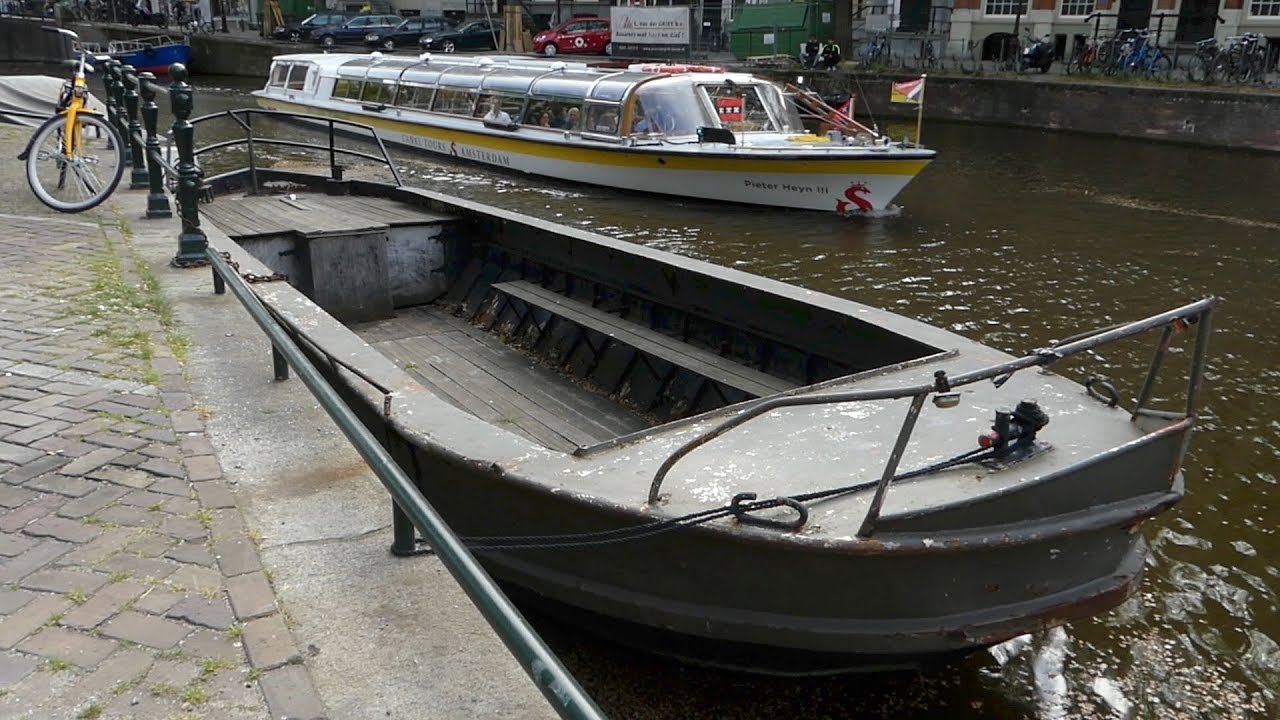 Amsterdam verdrijft bootjes - Erik Brey is niet blij