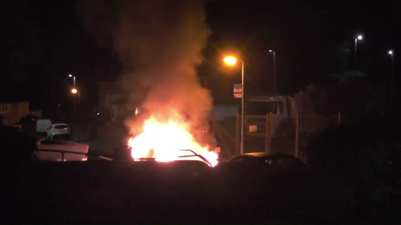 Car on Fire blows up and blows cameraman down