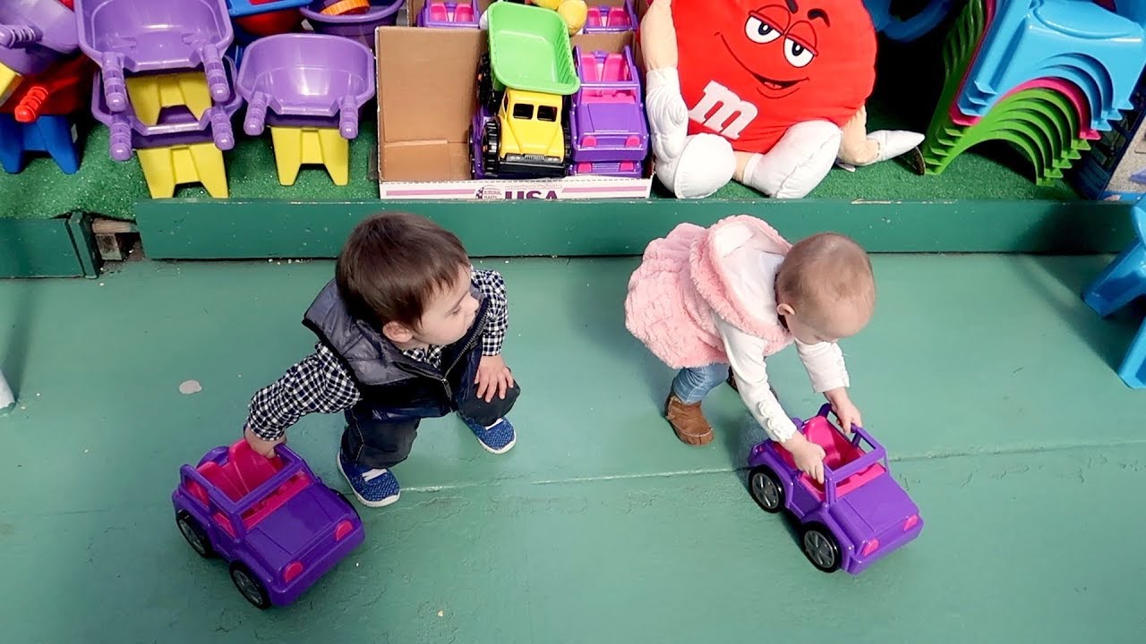 Twins Visit a Fun Easter Display & Toy Store!