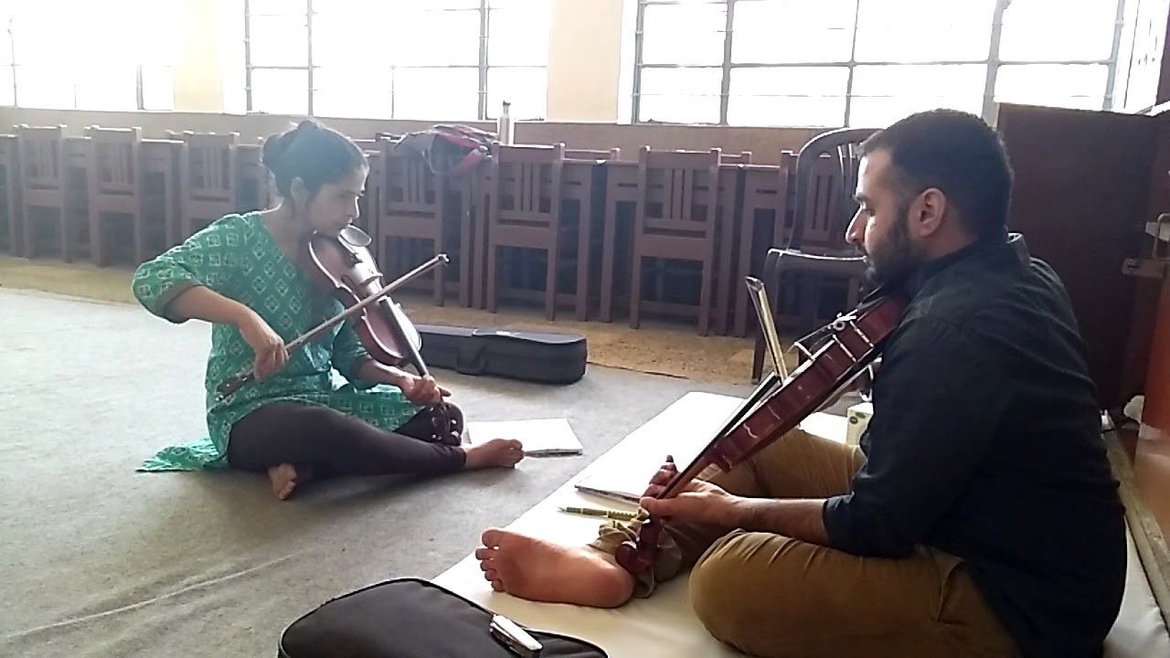 Teaching Violin at Aurobindo Ashram Delhi ( this is her 3rd day )