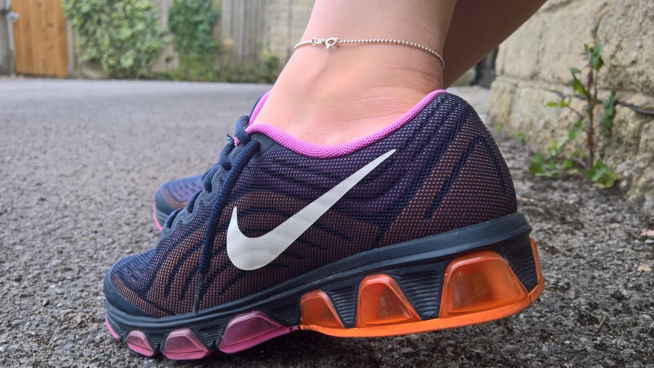 She is playing with her sockless Nike Airmax Tailwind