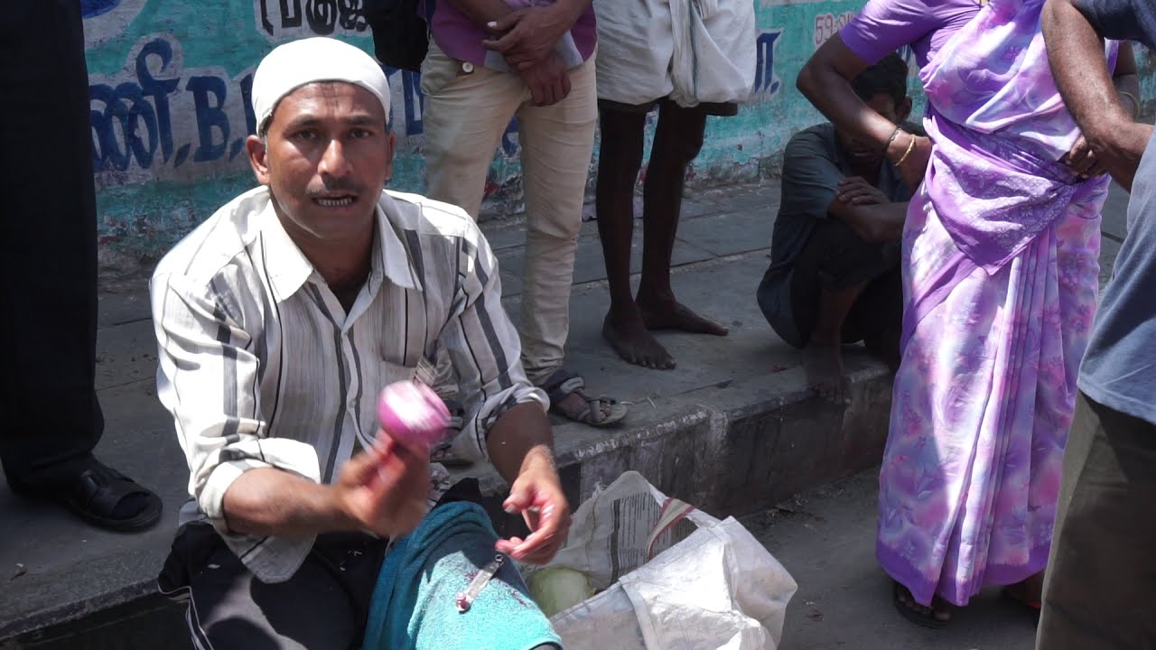 Indian street manual onion chopper