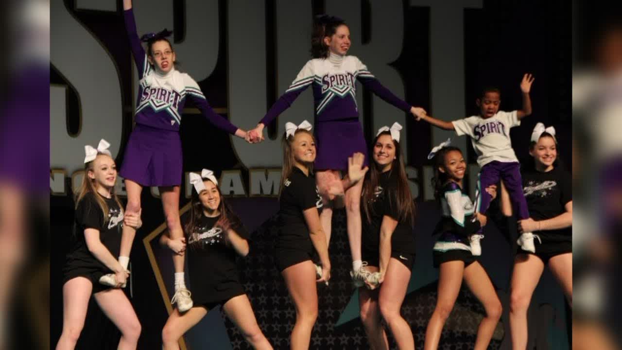 Special needs cheerleaders compete with team
