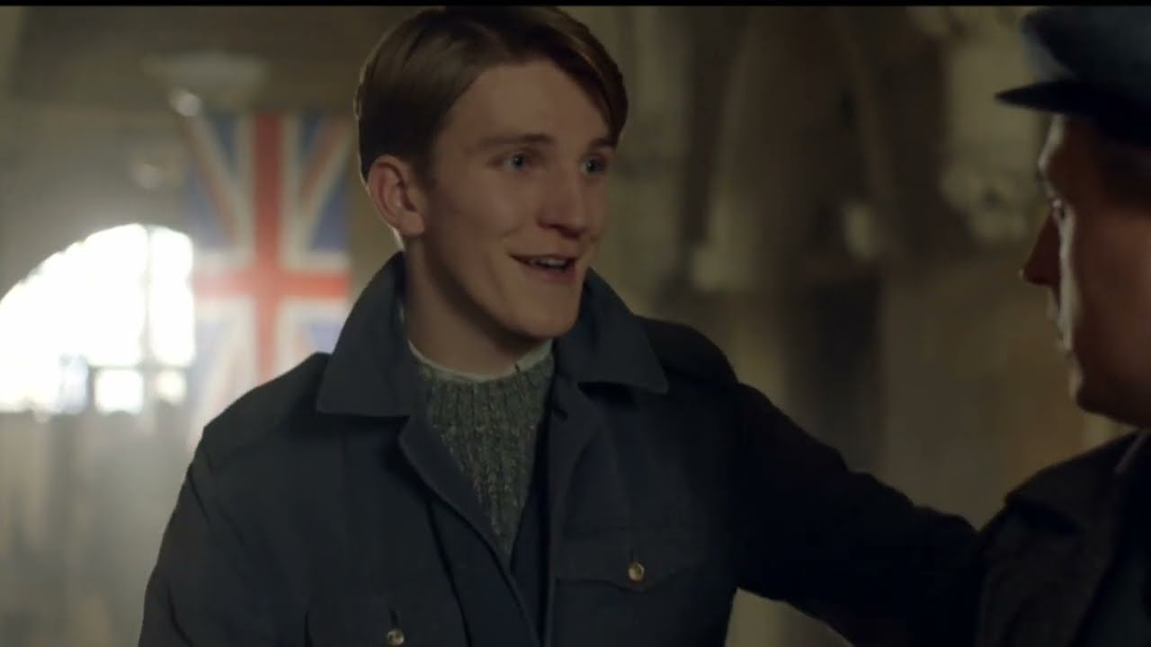 Ewan Mitchell smiling