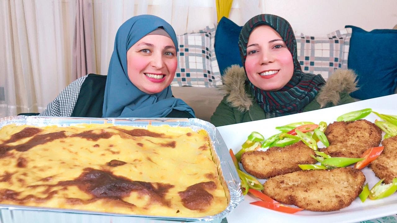 تحدى دجاج بانبه🍗 مع البشاميل🐓💪 بين ماما وابلة امال ضد خالو وبابا👭