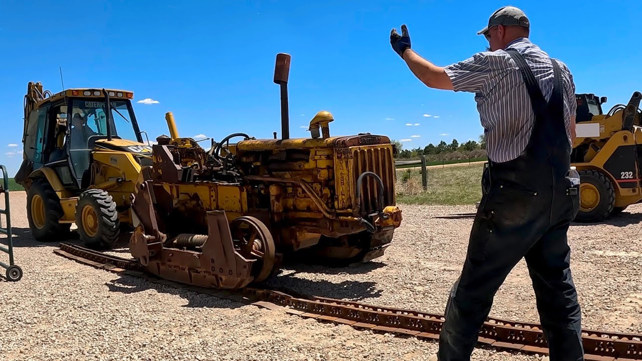 Caterpillar D4 track removal & replacement. 