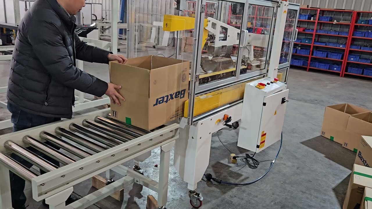 Automatic carton sealer with safety door #cartonsealer #cartonsealingmachine