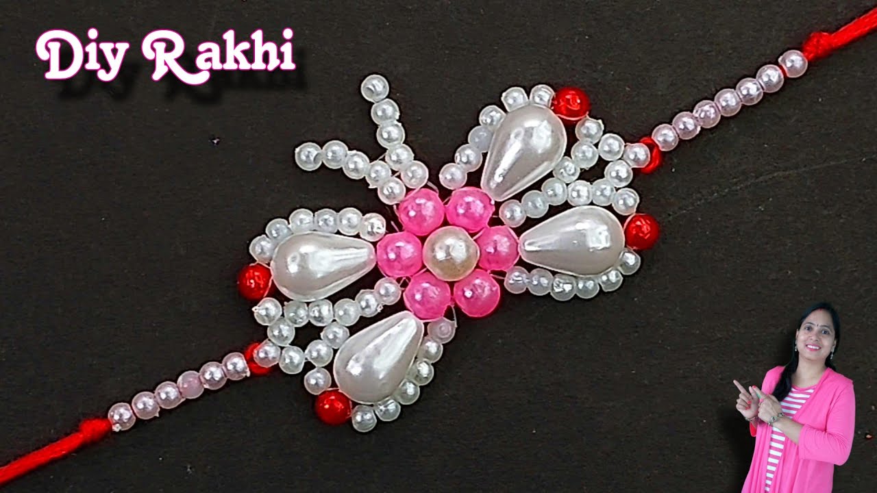 HOW TO MAKE BUTTERFLY SHAPED RAKHI WITH PEARLS /DIY RAKHI BEADSMAKING AT HOME 2023 / राखी कैसे बनाएं