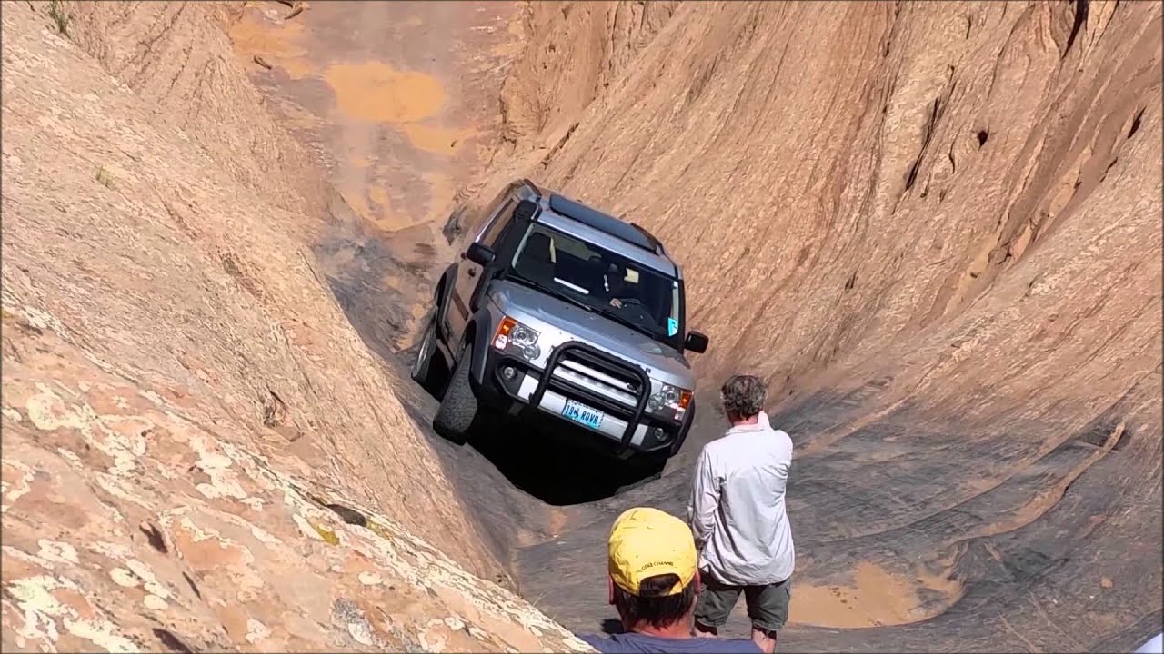 Range Rover nearly ROLLS OVER backward on Hell's Gate! - Hell's Revenge Moab
