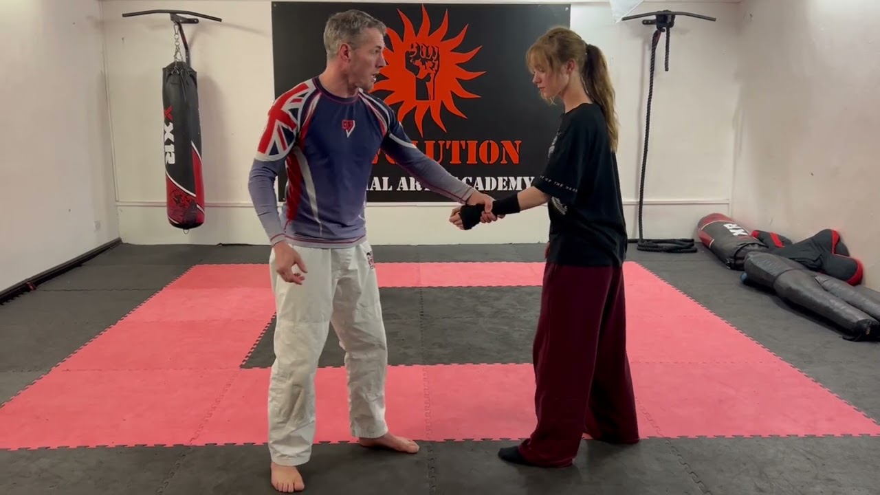 Avoid / escape a single arm wrist grab.