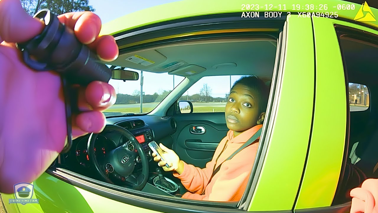 Woman Refuses to Exit Vehicle, Police Break Their Way in