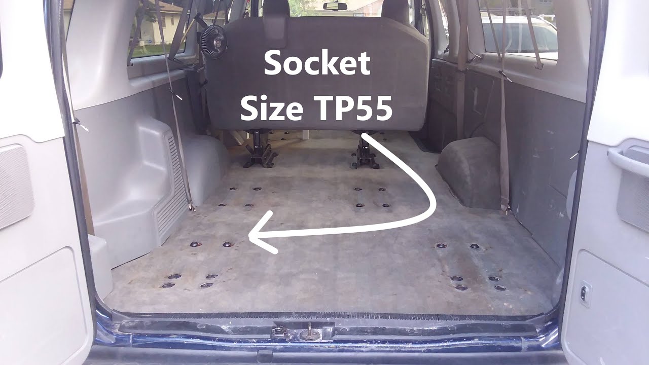 How to remove seat brackets from floor of Ford van