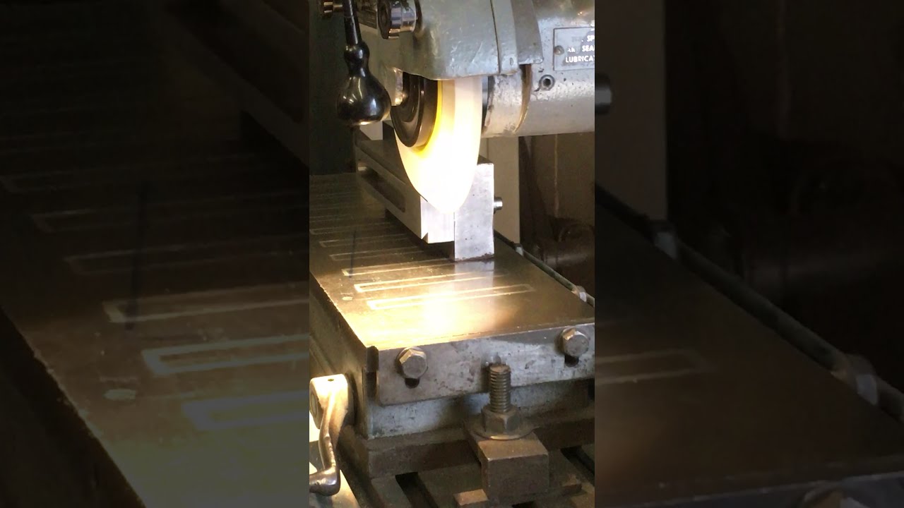Grinding the half scale Neumann VMS70 dovetail way.