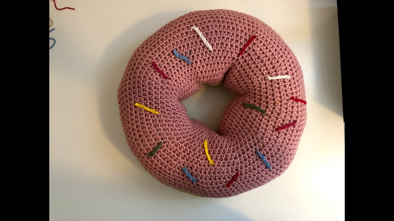 Joli coussin en beigne