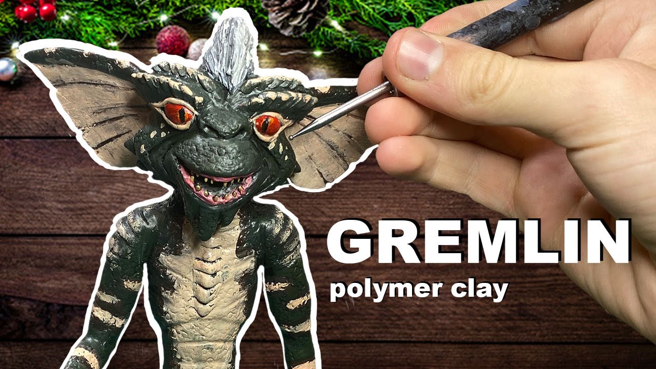 Christmas gremlin like you've never seen before, polymer clay.