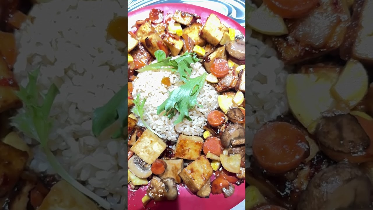 Cooking with Nate.  Tofu, mushrooms, zucchini, carrots, bell peppers, 🧅 and more