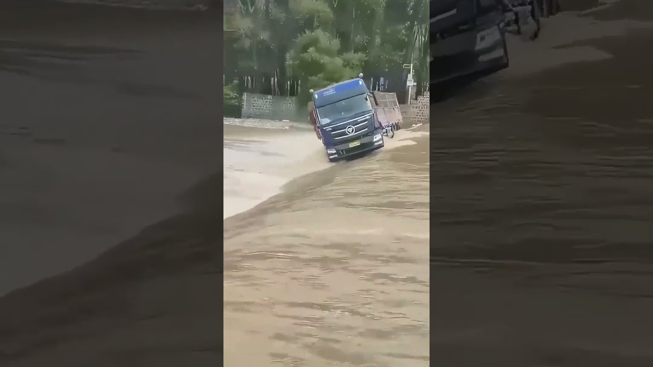 The truck struggled on the flood road and was eventually washed away