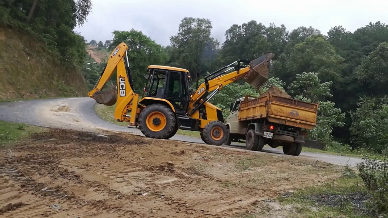 jcb 3dx super loading sand into a dump truck ## jcb 2018