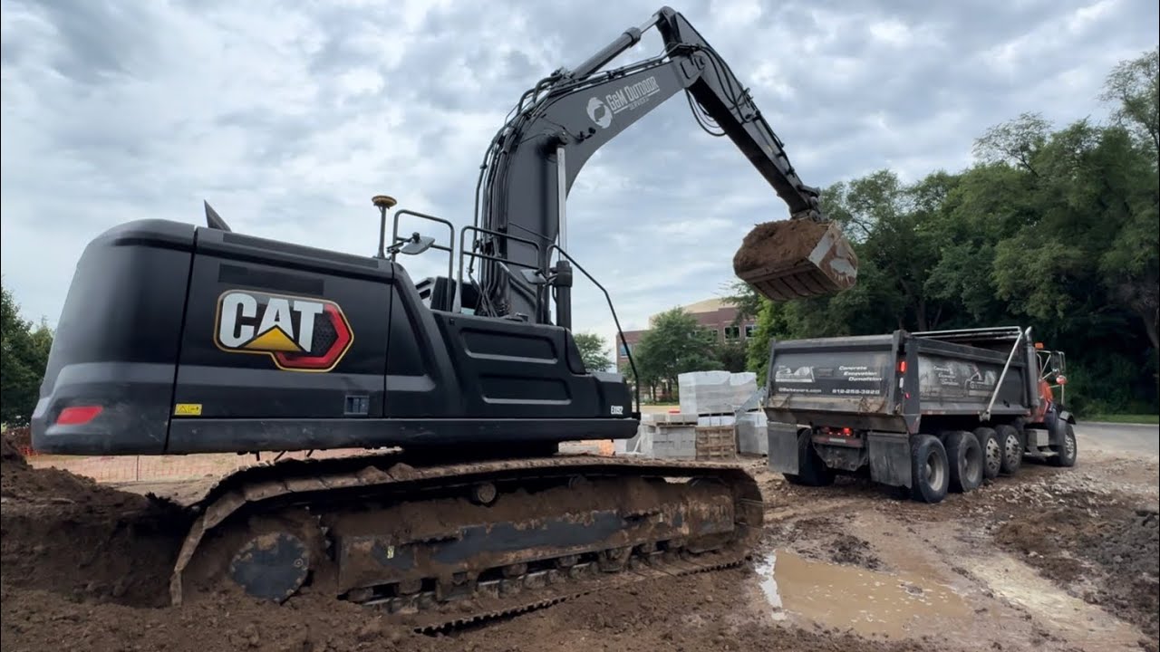 Loading trucks with a caterpillar 336 excavator! 
