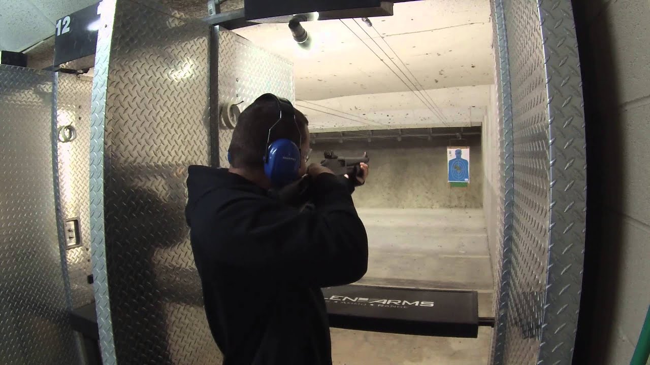 Shooting the short Pumpgun at the Shooting Range
