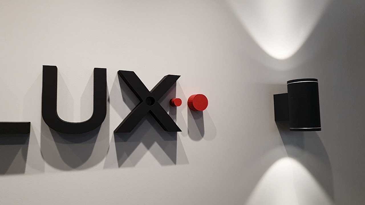 Светильники ALVA UP/DOWN возле лого ESYLUX в нашем офисе