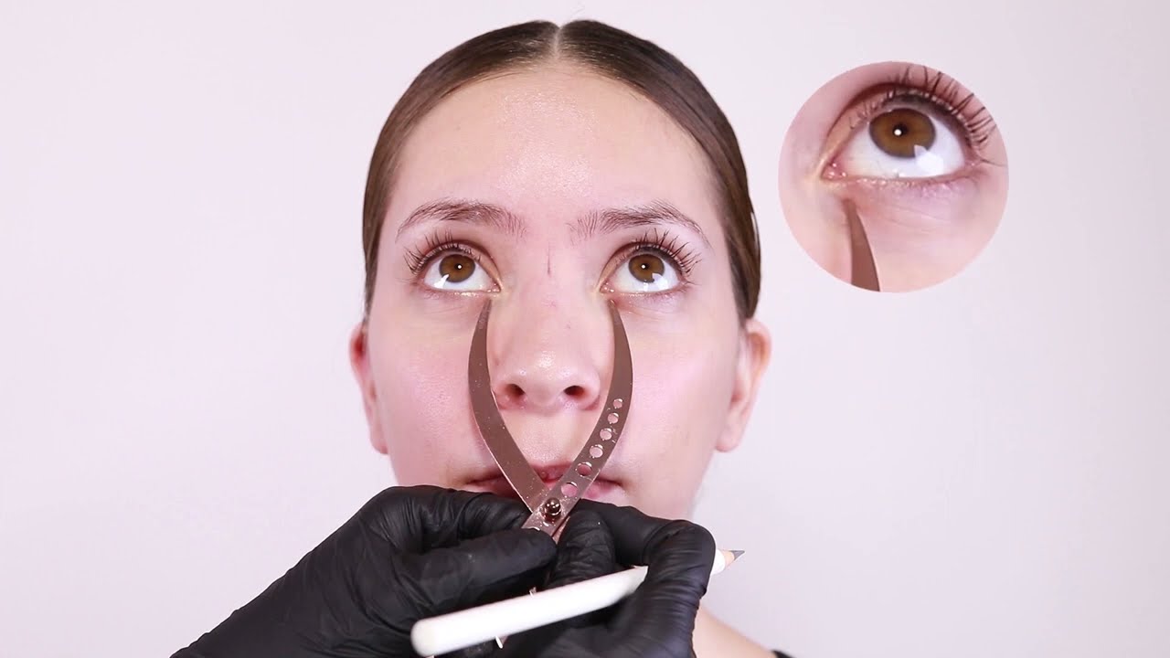 Drawing shape on a client with beauty Angels Golden Ration Compass
