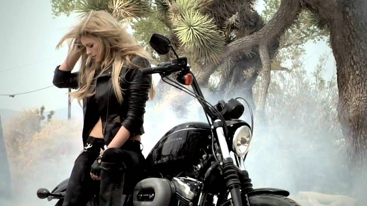 Supermodel Marissa Miller does a burnout on a Harley-Davidson